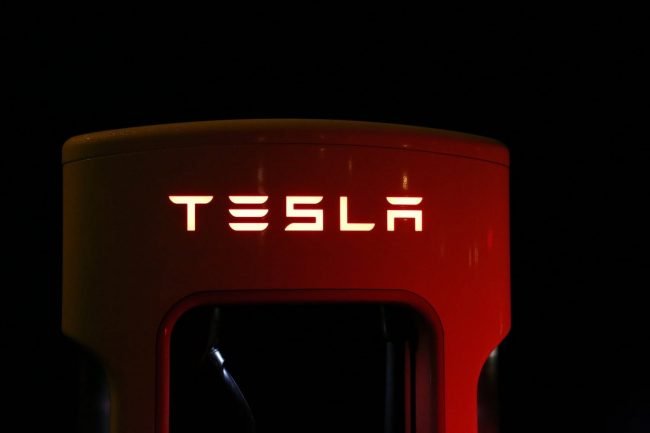 tesla logo charger pexels