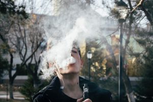 photography of a man using vape 10054861
