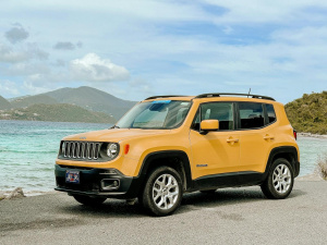 Oranžové SUV značky Jeep