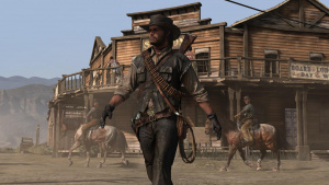 John Marston kráčí westernovým městem ve hře Red Dead Redemption